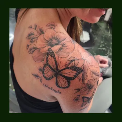 Butterfly shoulder tattoo