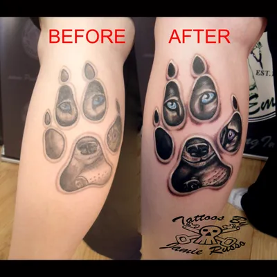 Paw print cover-up tattoo