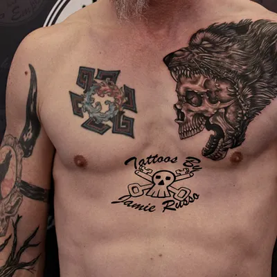 Wolf and skull tattoo