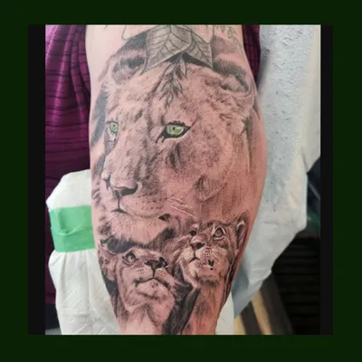 Green eyes portrait tattoo