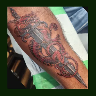 Sword and dragon tattoo