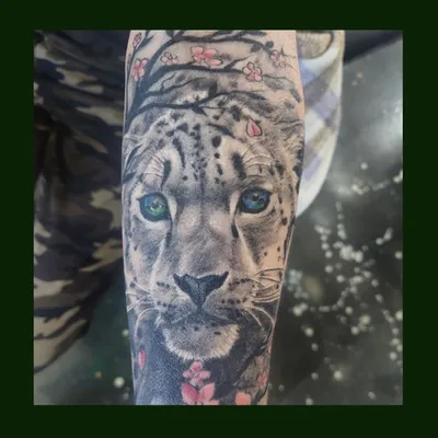 Blue eyes portrait tattoo